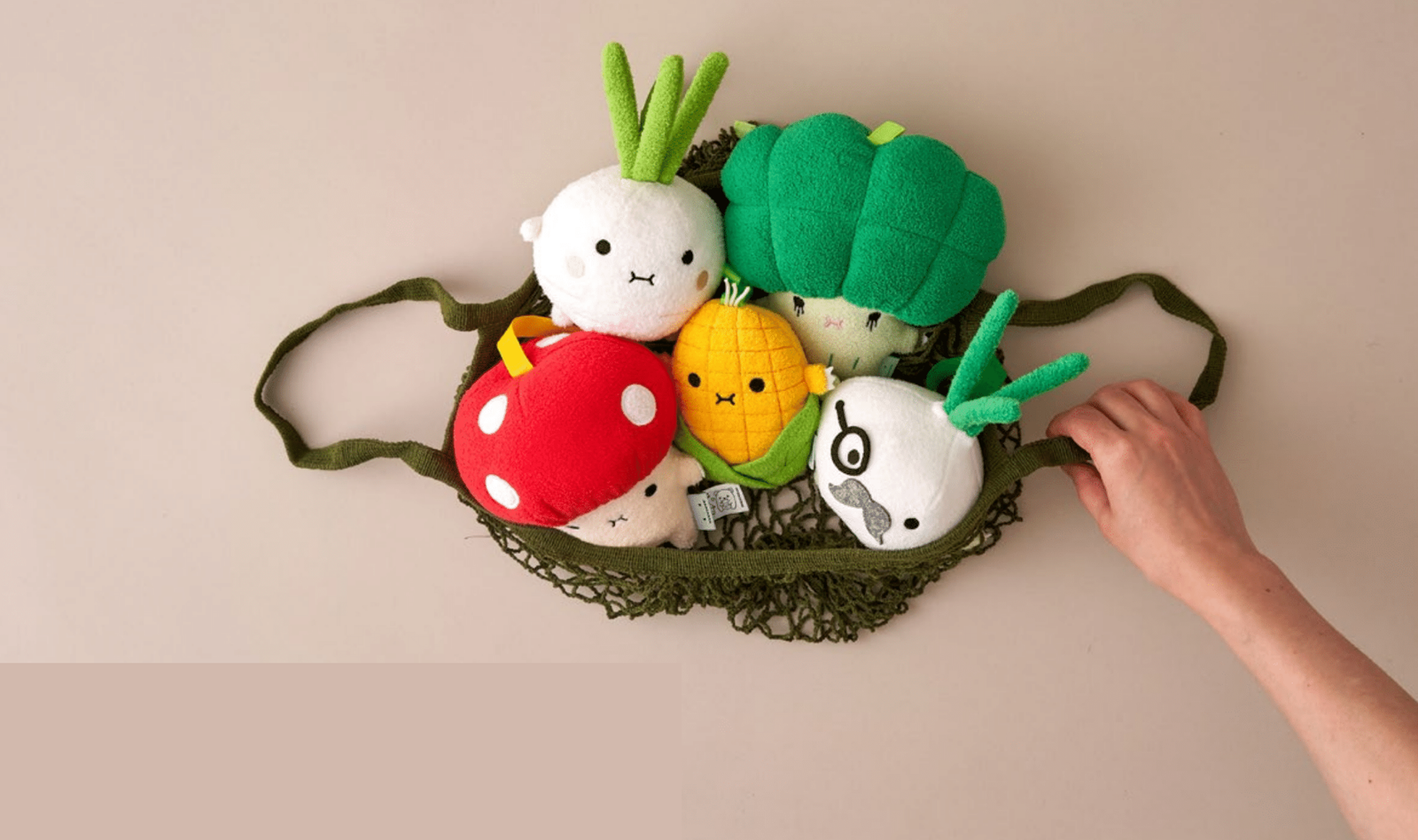 A basket filled with colorful plush toys