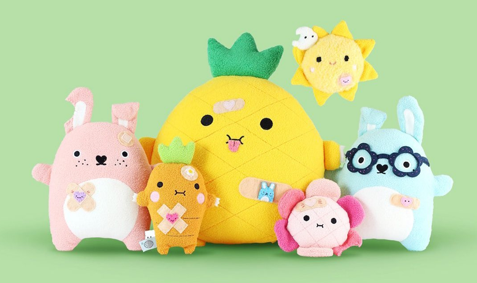 A cheerful group of colorful plush characters